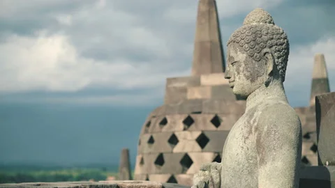 Buddha stone statue on top of Borobudur temple Stock Footage 97536020