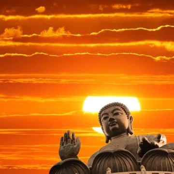 Buddha at sunset Stock Photos