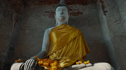 Buddha under a hole of light in the ceiling - AYUTTHAYA Stock Footage 176157528