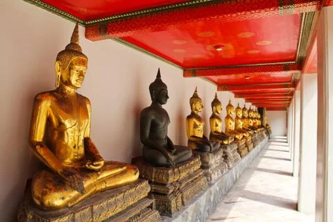 Buddha in wat pho temple sequential nicely in bangkok, thailand. Stock Photos