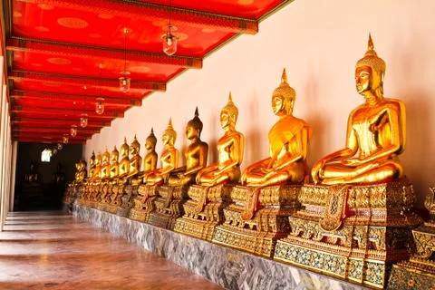 Buddha in wat pho temple sequential nicely in bangkok, thailand. Stock Photos