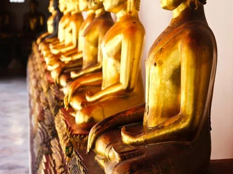 Buddha in wat pho temple sequential nicely in bangkok, thailand. Stock Photos