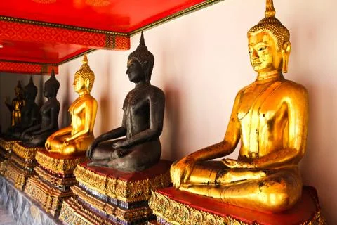 Buddha in wat pho temple sequential nicely in bangkok, thailand. Stock Photos