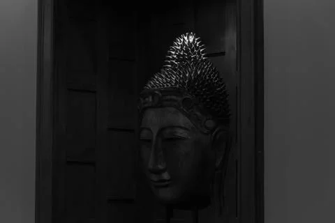 Buddha's head in dark tone and background Stock Photos