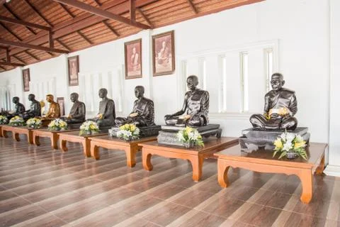 Buddhas in a row in the temple Stock Photos
