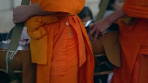 Buddhist Alms Giving Ceremony medium shot in Luang Prabang, Laos Видео 77582851
