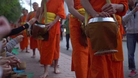 Buddhist Alms Giving Ceremony medium shot, Luang Prabang, Laos Stock-Footage 77584256