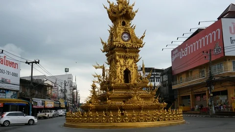 Buddhist architecture of clock tower in Chiang Rai and traffic, Thailand 스톡 동영상 120619960