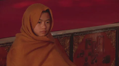 Buddhist boy sitting in the monastery hall, Myanmar. Stock Footage 55945190