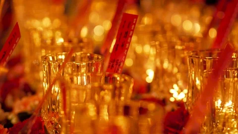Buddhist Candle Offering Stock Footage 106710892