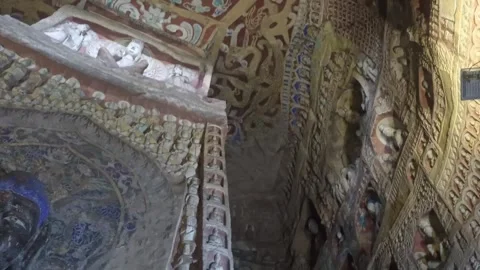 Buddhist Cave Decorations and Painted Reliefs at Yungang Grottoes, China Stock Footage 340673950
