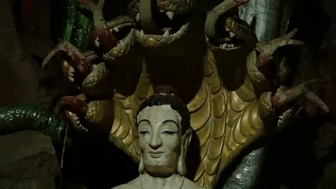 Buddhist Deity Being Caught By Python Monster Statue 動画素材 116470048