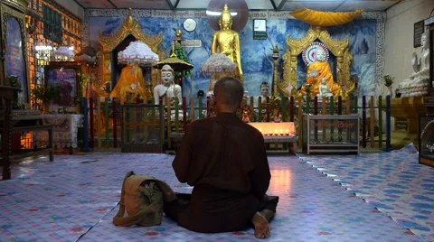 Buddhist Devotee Praying in Front of Temple Shrine in Yangon, Myanmar Stock Footage 42479297