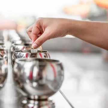 Buddhist donate money Stock Photos