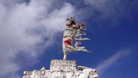 Buddhist flag flapping in the sky in Slow Motion Video stock 84731022