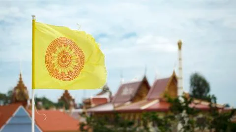 Buddhist flag in front of the temple Stock Photos