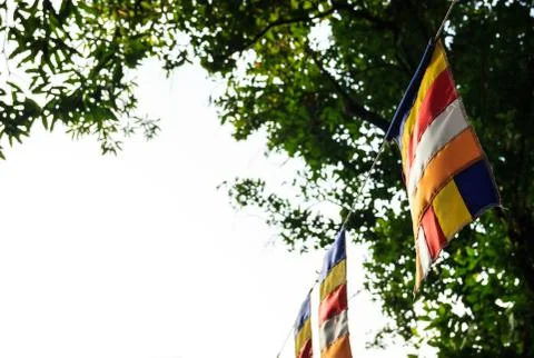 Buddhist flags in Buddhist temple with copy space. Symbol of Worship, Belief, Stock Photos