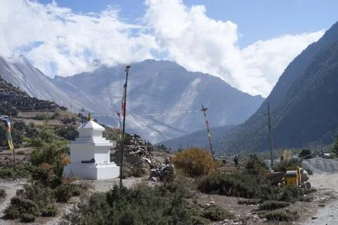 Buddhist gompa and prayer flags in the Himalaya range, Annapurna region, Nepal Stock Photos