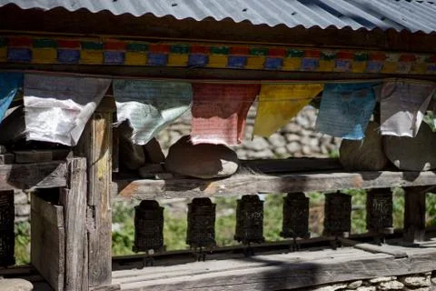 Buddhist gompa and prayer flags in the Himalaya range, Annapurna region, Nepal Stock Photos