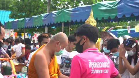 Buddhist Lent day and give alms to Devorohana. Buddhist culture in Thailand. Stock Footage 140391069