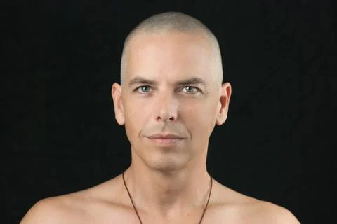 Buddhist looks to camera Stock Photos