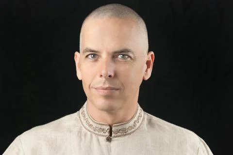 Buddhist looks to camera Stock Photos