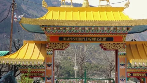 Buddhist monastery entrance gate from flat angle at day Stock Footage 244697630
