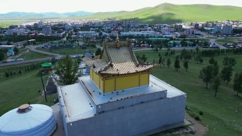 Buddhist monastery on grassy hill above city of Tsetserleg, Mongolia Stock Footage 345417690