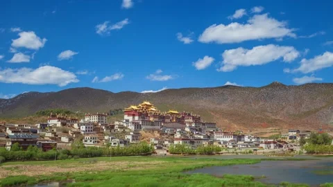 Buddhist monastery in mountains and clouds Stock Footage 173533458