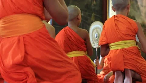Buddhist monk kneels down prayer in temple Stock Footage 11140174