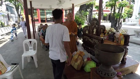 Buddhist monk makes preparation for ritual ceremony, temple in Bangkok, Thailand Stock Footage 161620411