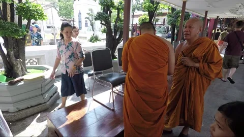 Buddhist monk makes preparation for ritual ceremony, temple in Bangkok, Thailand Stock Footage 161633294