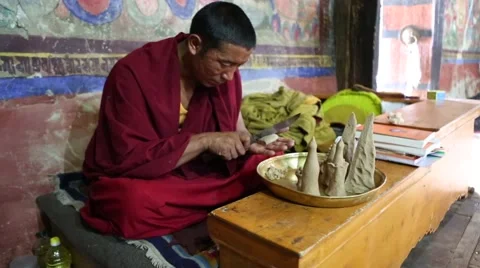 Buddhist Monk Making Crafts Video stock 51847301