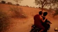 Buddhist monk on a motorcycle through the temples of Bagan, Myanmar HD Footage