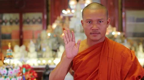 Buddhist monk with orange robe pray in temple Stock Footage 12178146