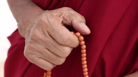 Buddhist Monk with Prayer Beads.mp4 Stock Footage 47594011