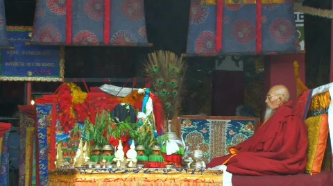Buddhist Monk praying inside Jokhang Temple, Tibet Stock Footage 97404