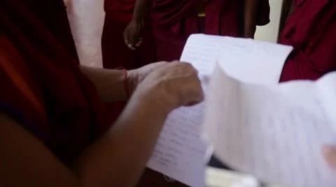 Buddhist Monk reading list of his students Video stock 60206705