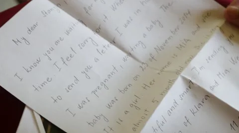 Buddhist Monk reading through letter from sponsor Stock Footage 60206885