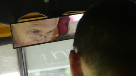 Buddhist Monk reflection in car mirror Stock Footage 60206832