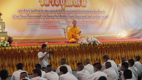 Buddhist Monk Sit &amp; Talk To Young Thai Students On Stage, Man Takes Video Photo Stock Footage 249979147