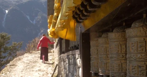 Buddhist Monk Spinning Prayer Wheels Stock Footage 71479073