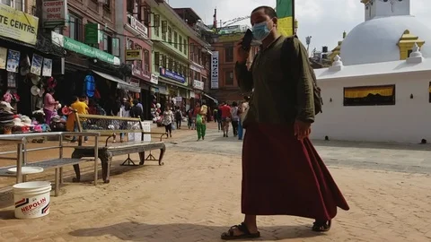Buddhist Monk Talking on Phone Stock Footage 104943260