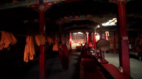 Buddhist monk walking out of monastery at temple, Mustang, Nepal Stock Footage 62923778