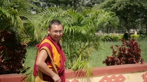 Buddhist Monk walking somewhere Stock Footage 60205436