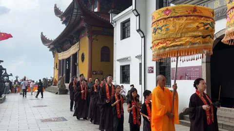 Buddhist monks conducting rite at Ancient Sutra Worship Platform on Mount Jiuhua Stock Footage 249083045