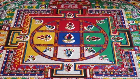 Buddhist monks create a sand mandala Stock Footage 156686915