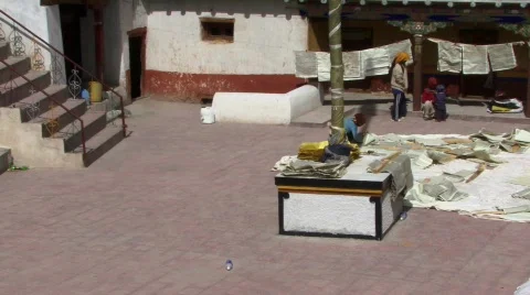 Buddhist monks creating scripts in Monastery Stock Footage