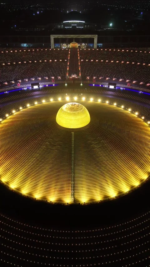 Buddhist Monks Meditating During a Night Ceremony in Bangkok, Thailand Stock Footage 335941760