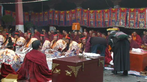 Buddhist monks performing ceremony inside Jokhang Temple Tibet 스톡 동영상 97395